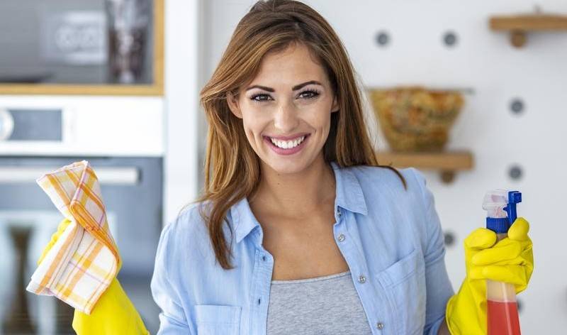 Women with cleaning tools