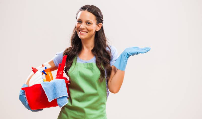Women with cleaning supplies