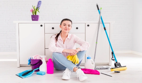 Woman cleaning her home