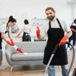 professional bearded cleaner from cleaning service vacuums carpet